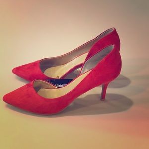 Red suede pumps
